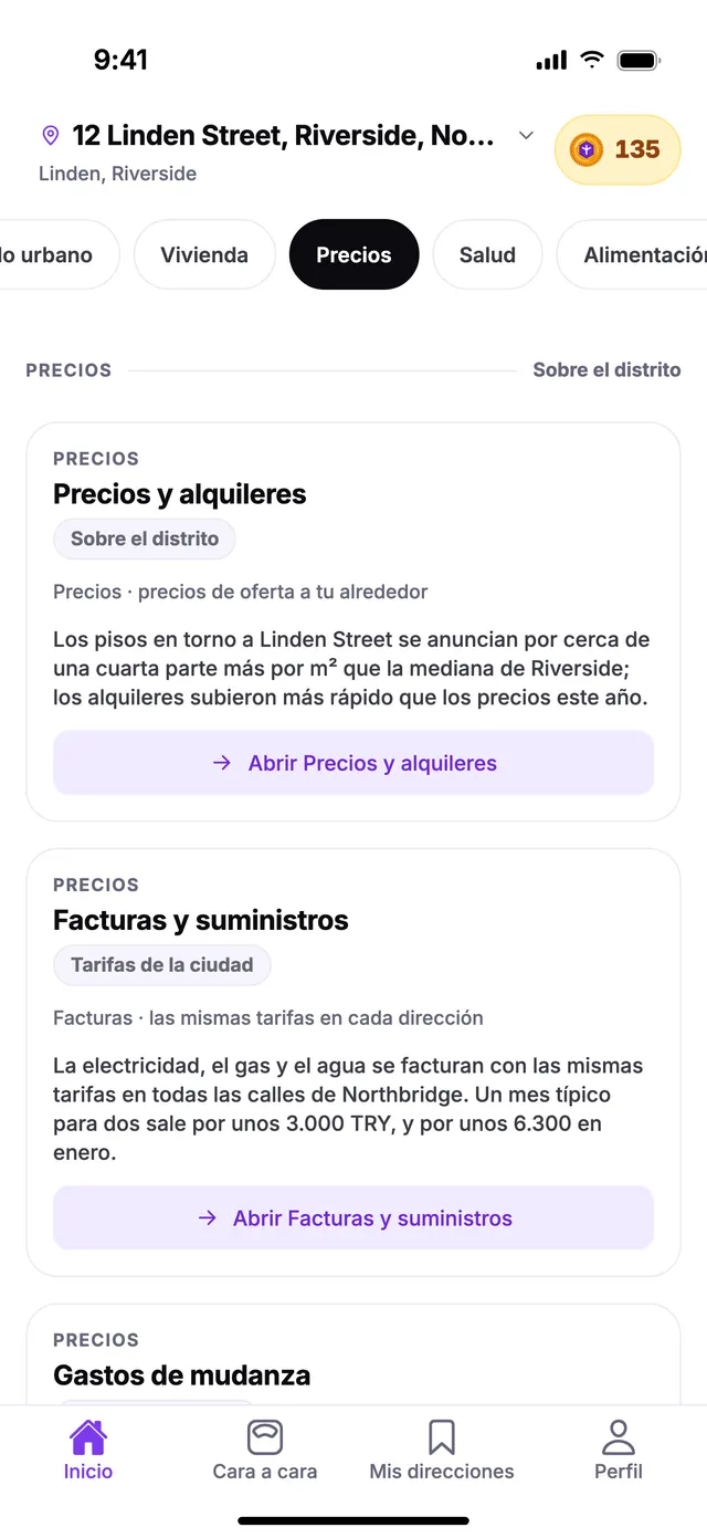 El grupo Precios en la pantalla de Inicio de TownSpec, con una dirección de ejemplo.